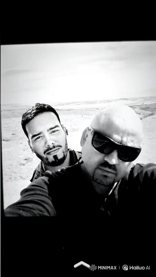 Intimate Moment Between Two Men in Vast Landscape – AI Generated Video | Hailuo AI