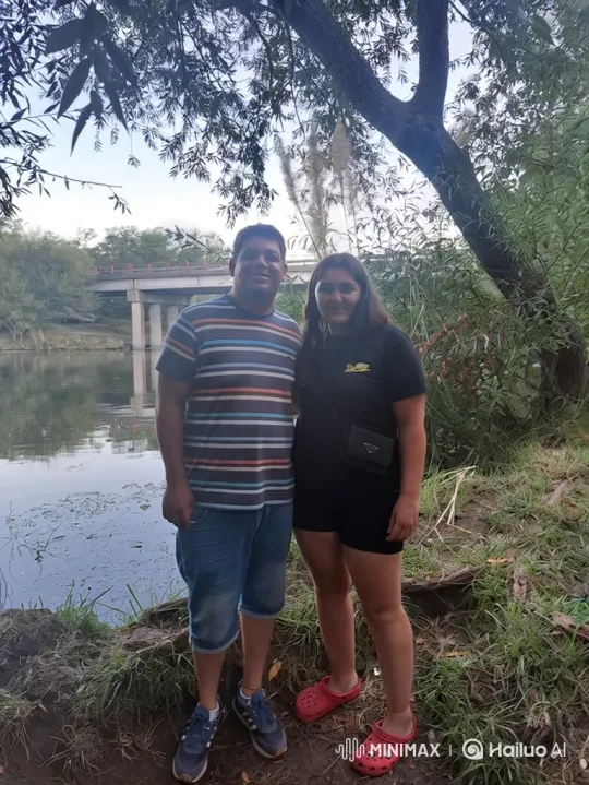 Family Embraces by the Riverside – AI Generated Video | Hailuo AI