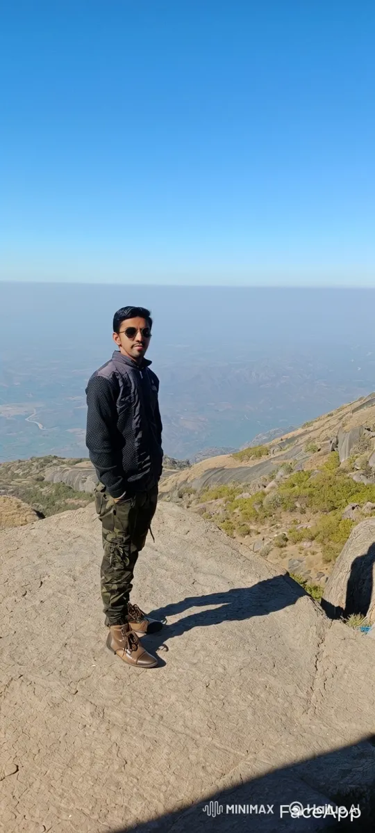 Man Contemplates Vast Mountain View – AI Generated Video | Hailuo AI