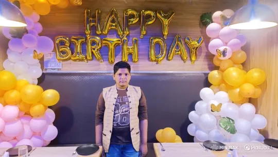 Young Boy's Birthday Celebration and Respectful Handshake Exchange – AI Generated Video | Hailuo AI