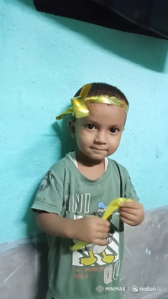 Child's Curious Play with a Golden Ribbon – AI Generated Video | Hailuo AI