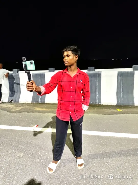 Young Man Records Himself on a Dark Night Road – AI Generated Video | Hailuo AI