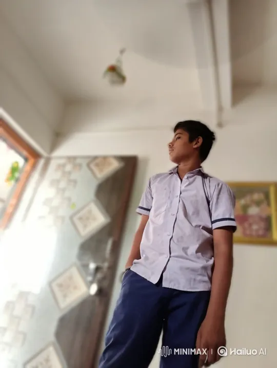 Young Boy in Thoughtful Stance, Camera Closes In – AI Generated Video | Hailuo AI