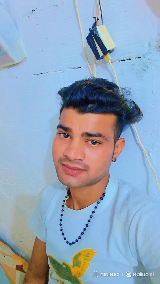 Young Man in White Tee with Calm, Confident Smile – AI Generated Video | Hailuo AI