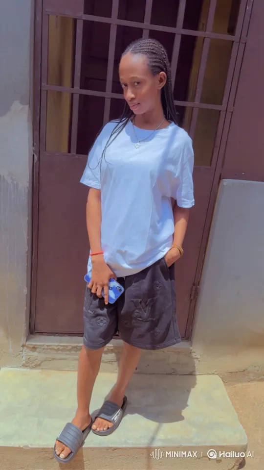 Young Woman on Steps, Casual and Calm Pose – AI Generated Video | Hailuo AI