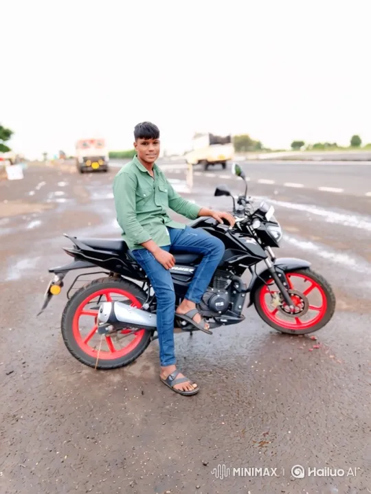 Young Man on Motorcycle Amidst Overcast Road Scene – AI Generated Video | Hailuo AI