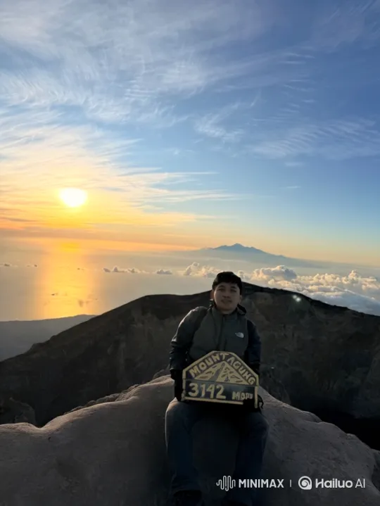 Man at Mount Agung's Summit: Earth from Space Perspective – AI Generated Video | Hailuo AI