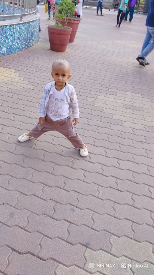 Young Boy Enters Futuristic MINIMAXROO Car on Plaza – AI Generated Video | Hailuo AI