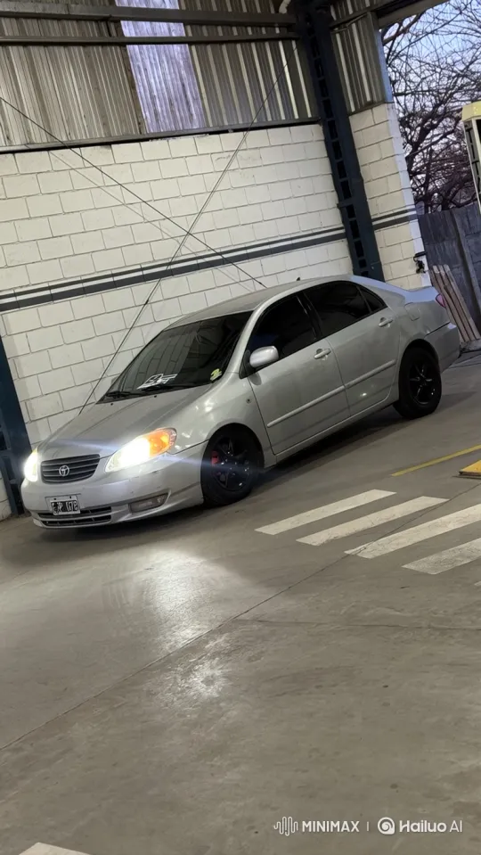 Silver Sedan Transforms with Graceful Lowering in Garage – AI Generated Video | Hailuo AI