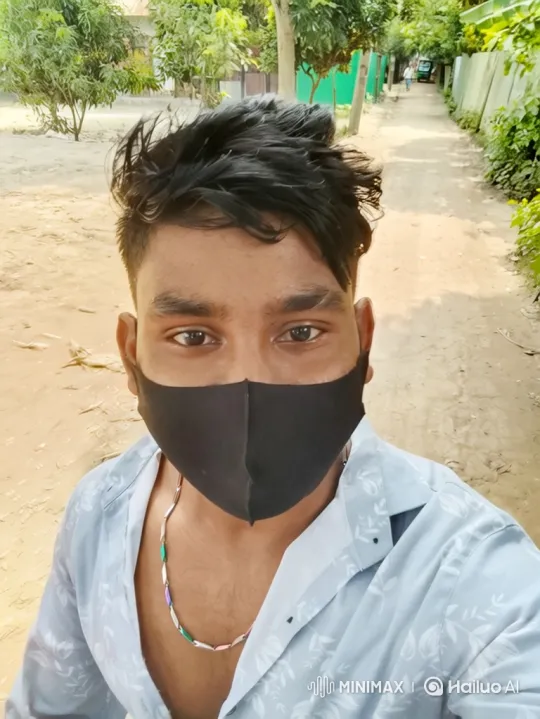Young Man in Nature, Wearing Face Mask, Steady Gaze – AI Generated Video | Hailuo AI