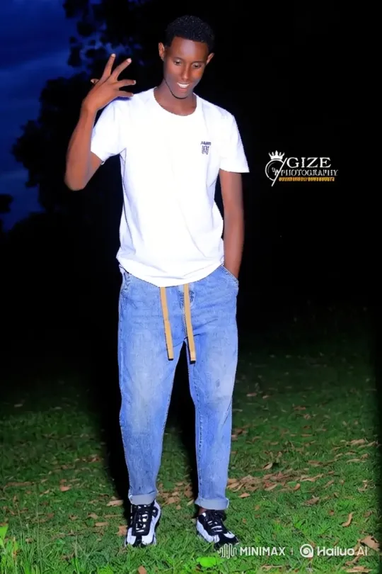 Young Man on Lawn: Nighttime, Camera Motion, Expanding View – AI Generated Video | Hailuo AI