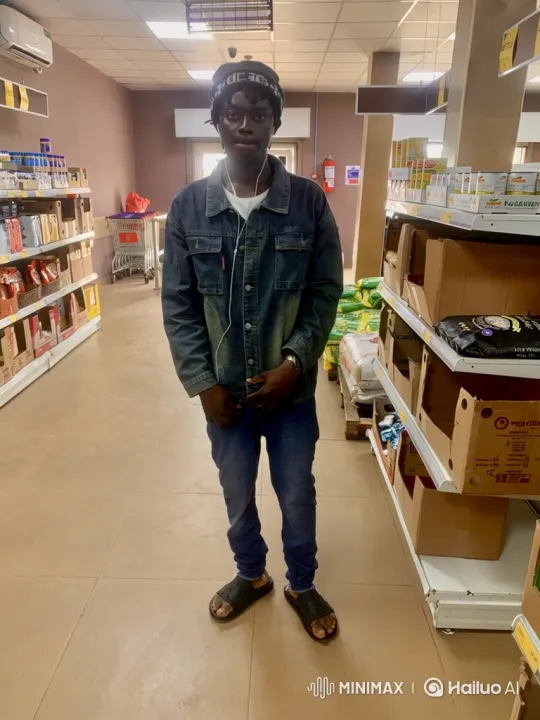 Young Black Man in Grocery Store: A Static and Slow Zoom-In – AI Generated Video | Hailuo AI