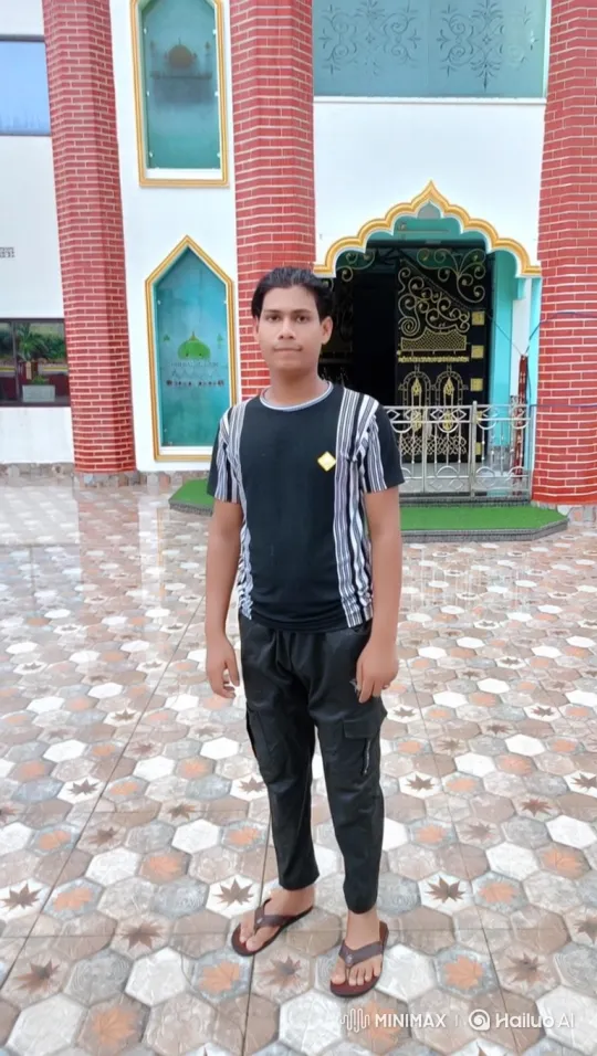 Young Man Stands Calmly on Wet Patio in Neutral Pose – AI Generated Video | Hailuo AI