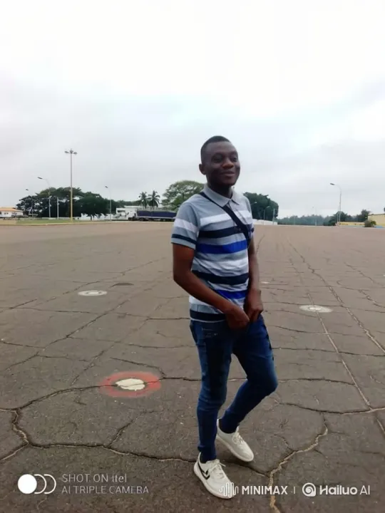 Young Man Walks Confidently Towards Jet on Airfield – AI Generated Video | Hailuo AI