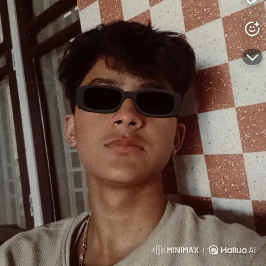 Young Man Surprised by Girl's Kiss Against Checkered Wall – AI Generated Video | Hailuo AI