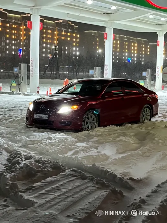 Night Panorama: Car to Earth Zoom-Out in Snowy Cityscape – AI Generated Video | Hailuo AI