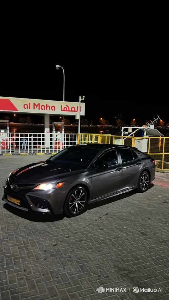 Sleek Sedan Reflects Nocturnal Gas Station Scene – AI Generated Video | Hailuo AI