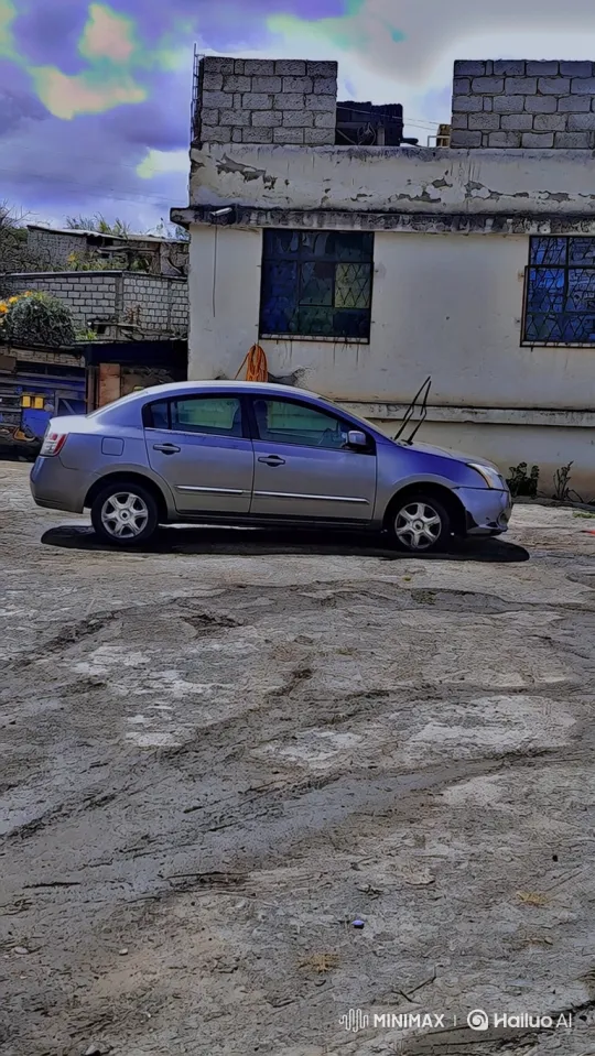 Silver Sedan Lowers on Muddy Lot with Air Suspension – AI Generated Video | Hailuo AI