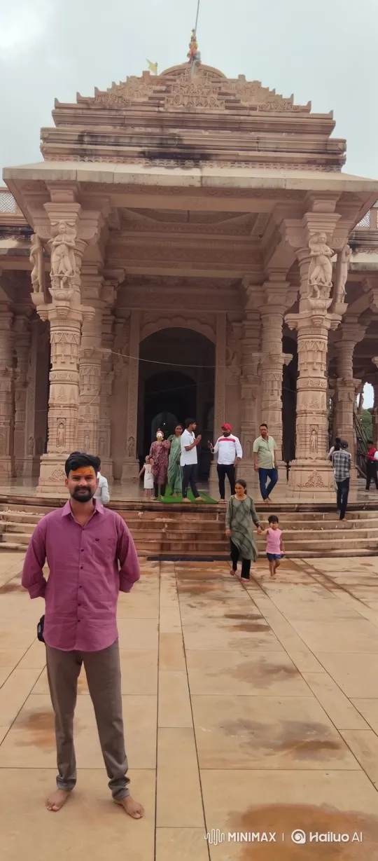 Indian Actor Meets Man in Courtyard of Stone Building – AI Generated Video | Hailuo AI