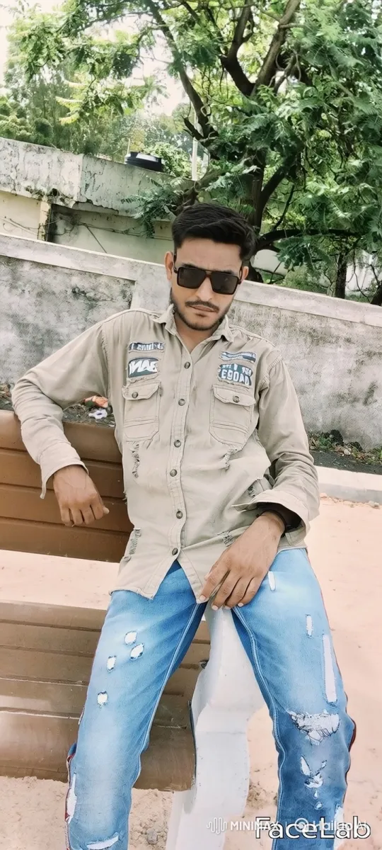 Young Man Meditates on Park Bench Amidst Nature – AI Generated Video | Hailuo AI