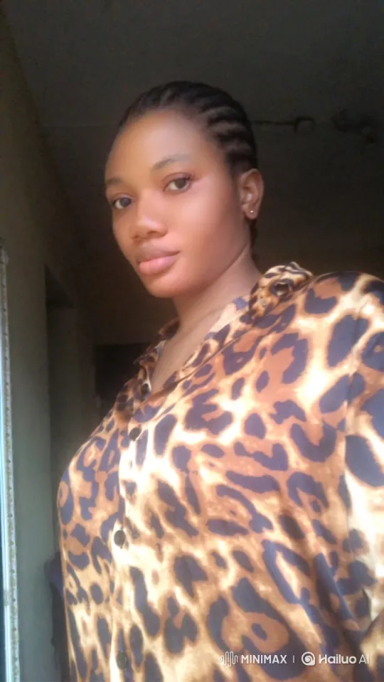 Young Black Woman with Cornrows in Serene Gaze – AI Generated Video | Hailuo AI