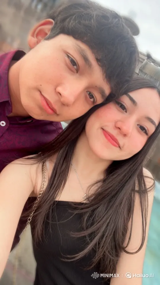 Young Couple and Their Son Share a Tender, Candid Moment – AI Generated Video | Hailuo AI