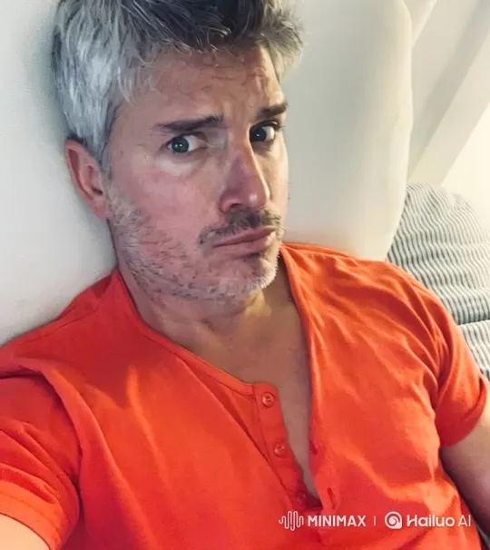 Middle-Aged Man Greeting with a Friendly Wave – AI Generated Video | Hailuo AI
