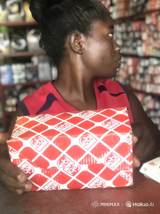 Woman Ponders Auto Part Purchase in Store – AI Generated Video | Hailuo AI
