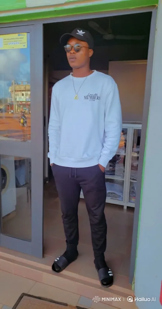 Man in White Sweatshirt Boards Helicopter in Open Field – AI Generated Video | Hailuo AI