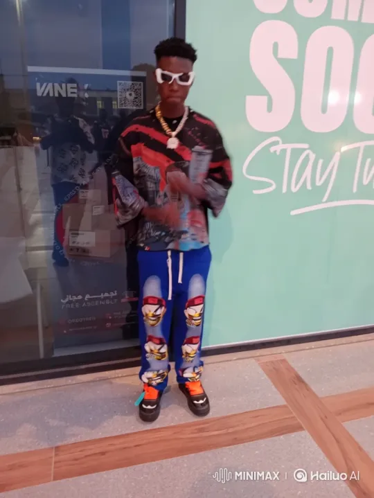 Young Man Poses Confidently in Urban Setting – AI Generated Video | Hailuo AI