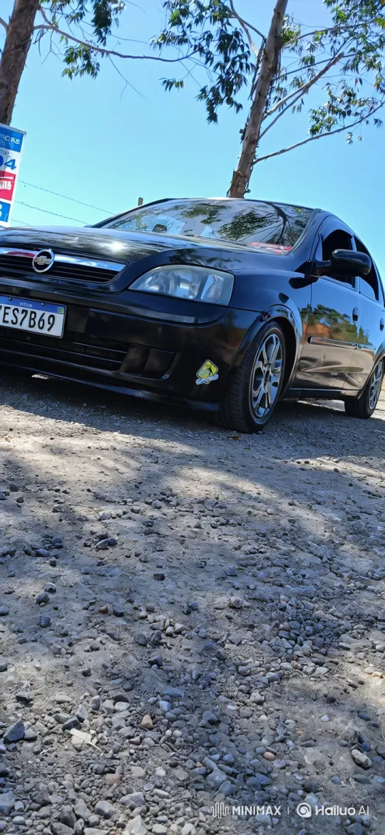 Glossy Black Hatchback Lowers on Air Suspension – AI Generated Video | Hailuo AI
