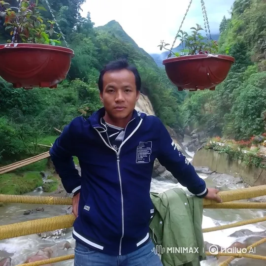 Man on Bridge Amidst Dynamic Mountain Landscape – AI Generated Video | Hailuo AI