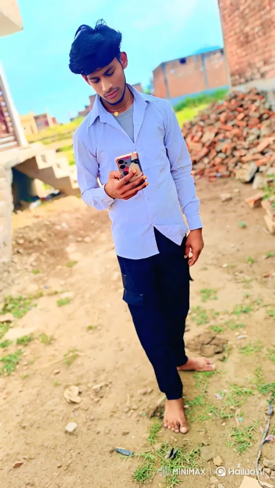Young Man Reflects on Smartphone, Smiles Gently – AI Generated Video | Hailuo AI