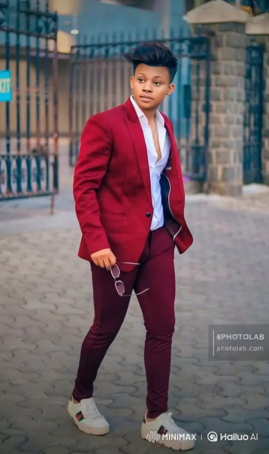 Young Man in Burgundy Suit Walks with Poise – AI Generated Video | Hailuo AI