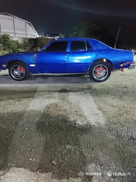 Night Drive of a Classic Blue Sedan with Chrome Wheels – AI Generated Video | Hailuo AI