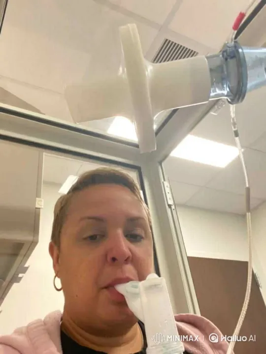 Hospital Scene: Woman Using Nebulizer, Nurse Adjusting Equipment – AI Generated Video | Hailuo AI