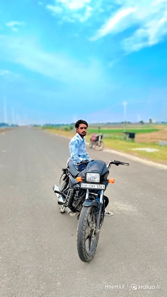 Young Man on Motorcycle Amidst Windy Rural Landscape – AI Generated Video | Hailuo AI