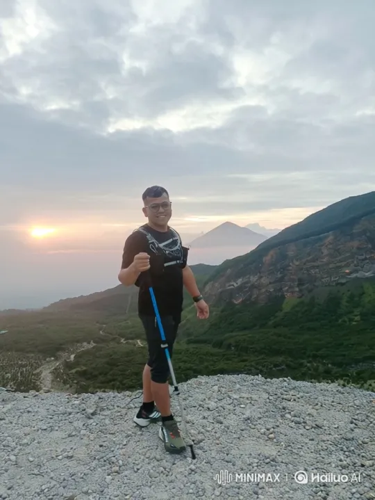 Triumphant Hiker on Majestic Mountain Summit – AI Generated Video | Hailuo AI