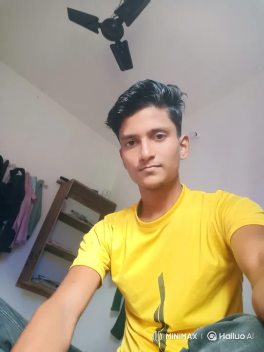 Young Man in Yellow T-Shirt Smiles Warmly – AI Generated Video | Hailuo AI