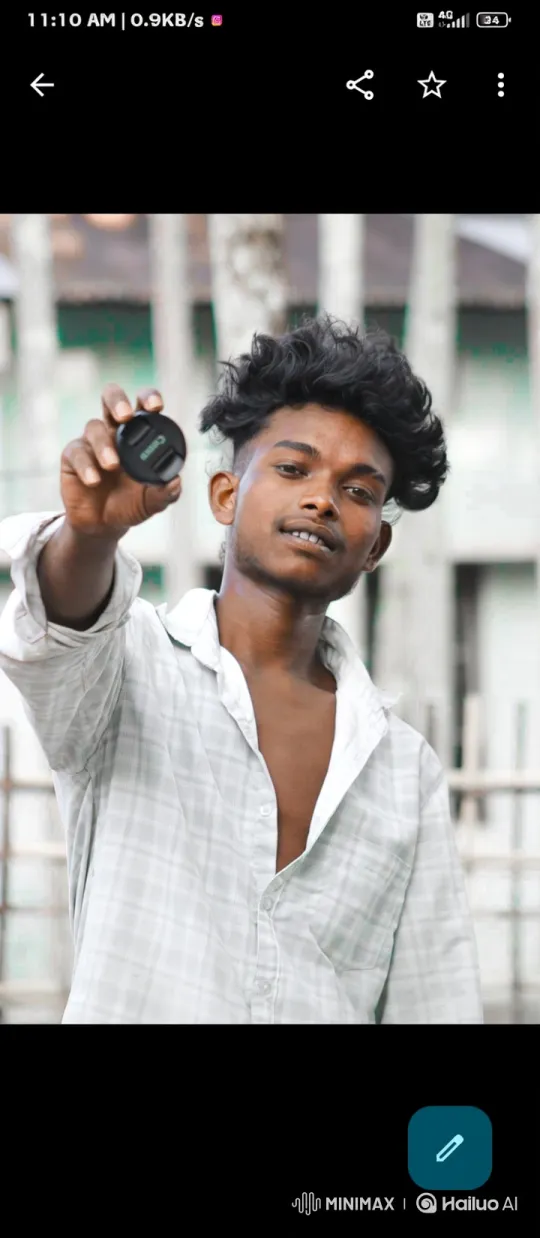 Young Man with Camera Lens Cap in Focused Pose – AI Generated Video | Hailuo AI