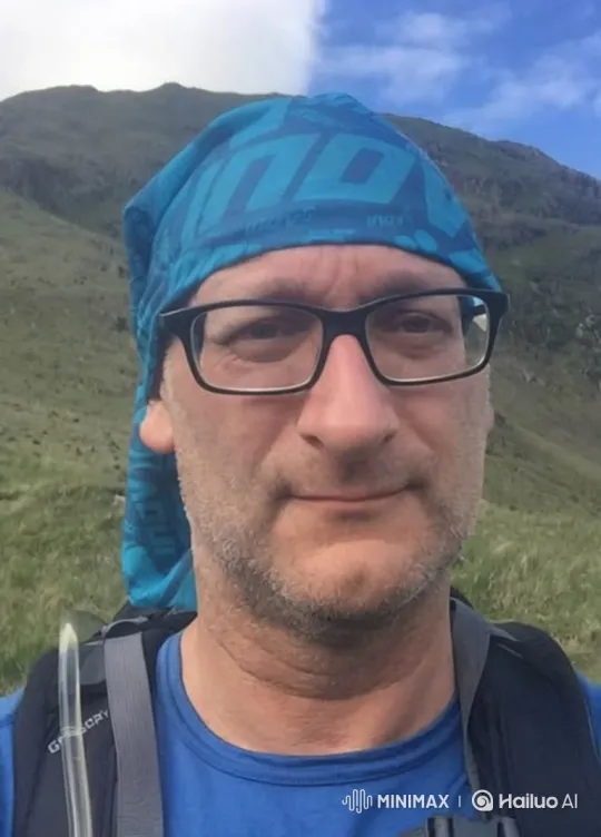 Man Smiles Cheerfully in Mountain Landscape – AI Generated Video | Hailuo AI