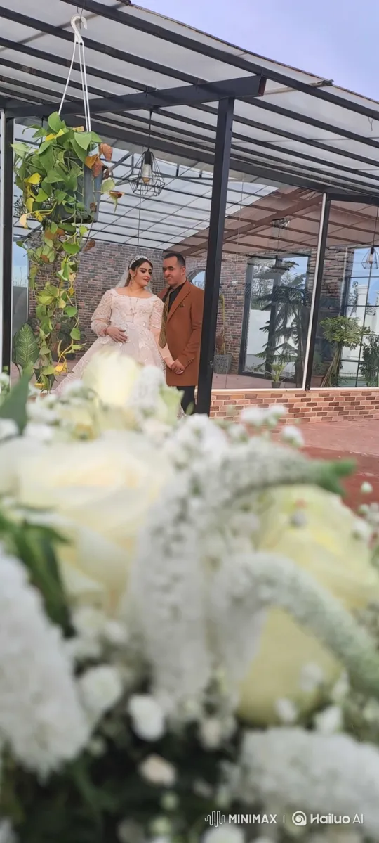 Couple in Love Amidst Modern Patio and Flowers – AI Generated Video | Hailuo AI