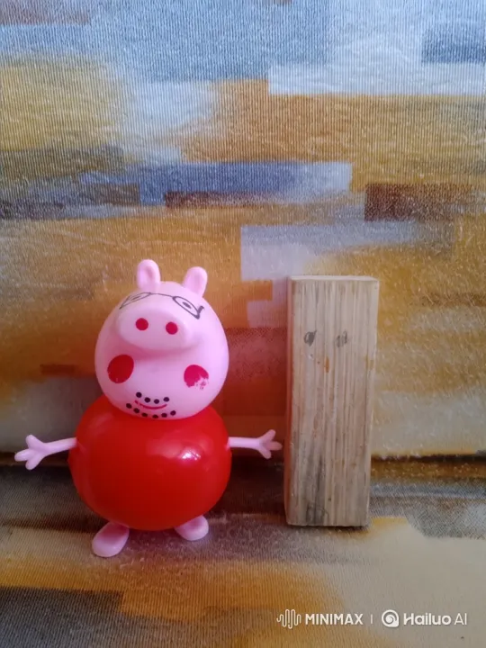 Static Shot of Rocking Toy Pig and Wooden Block – AI Generated Video | Hailuo AI