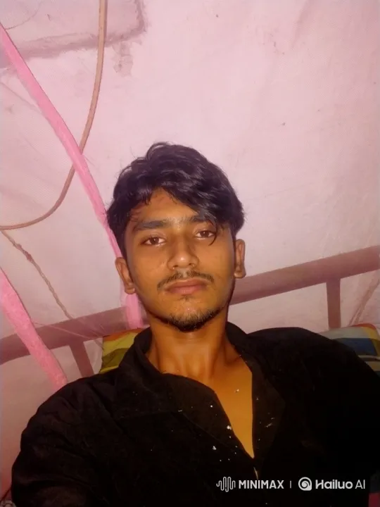 Young Man with Calm Expression Holds Steady Gaze – AI Generated Video | Hailuo AI