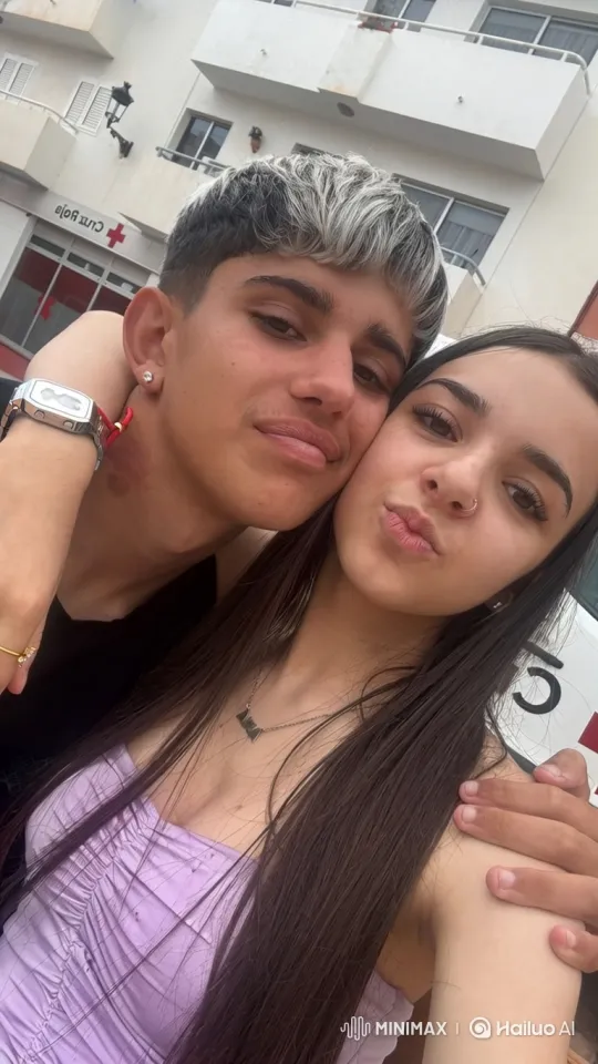 Young Family's Joyful Street Embrace Captured on Video – AI Generated Video | Hailuo AI