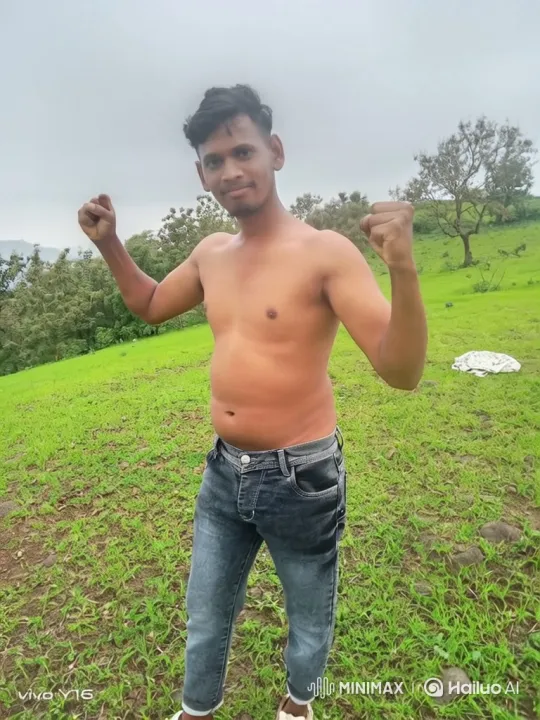 Young Man Poses Confidently on Green Hillside – AI Generated Video | Hailuo AI