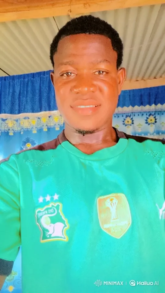 Young Black Man in Ivory Coast Jersey Smiles Warmly – AI Generated Video | Hailuo AI