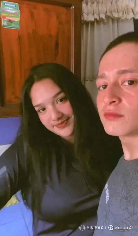 Young Couple and Their Son's Embrace Captured on Video – AI Generated Video | Hailuo AI