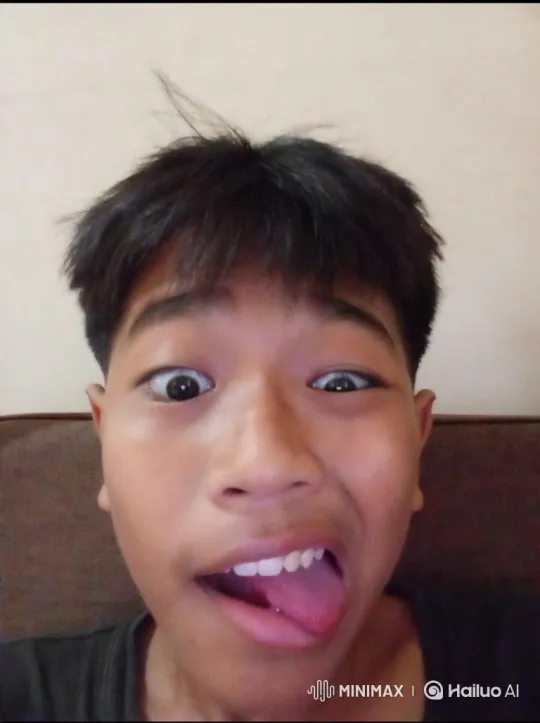 Young Person Performing Silly Dance with Playful Expression – AI Generated Video | Hailuo AI