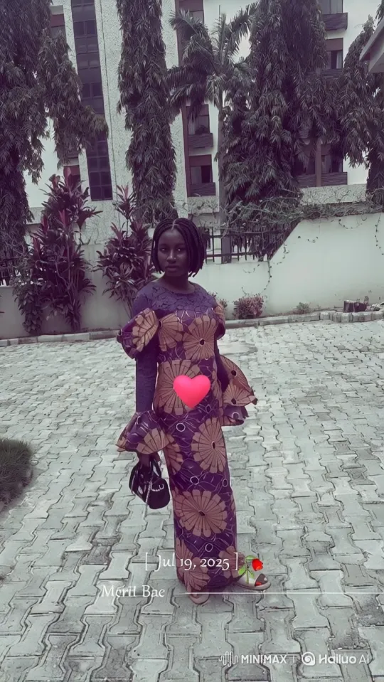 Elegant Woman in Floral Gown Walks Across Courtyard – AI Generated Video | Hailuo AI